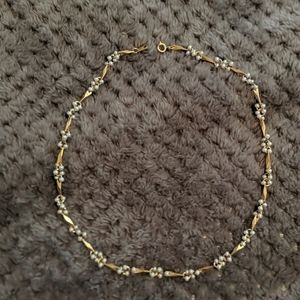 Gold and white bead necklace
